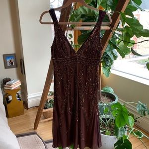 Dressy sequined brown knee length dress